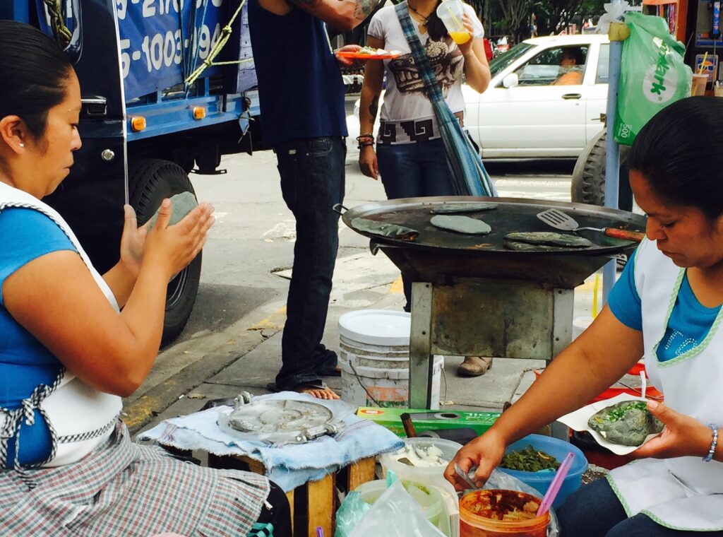 Women making huaraches, Mexico City